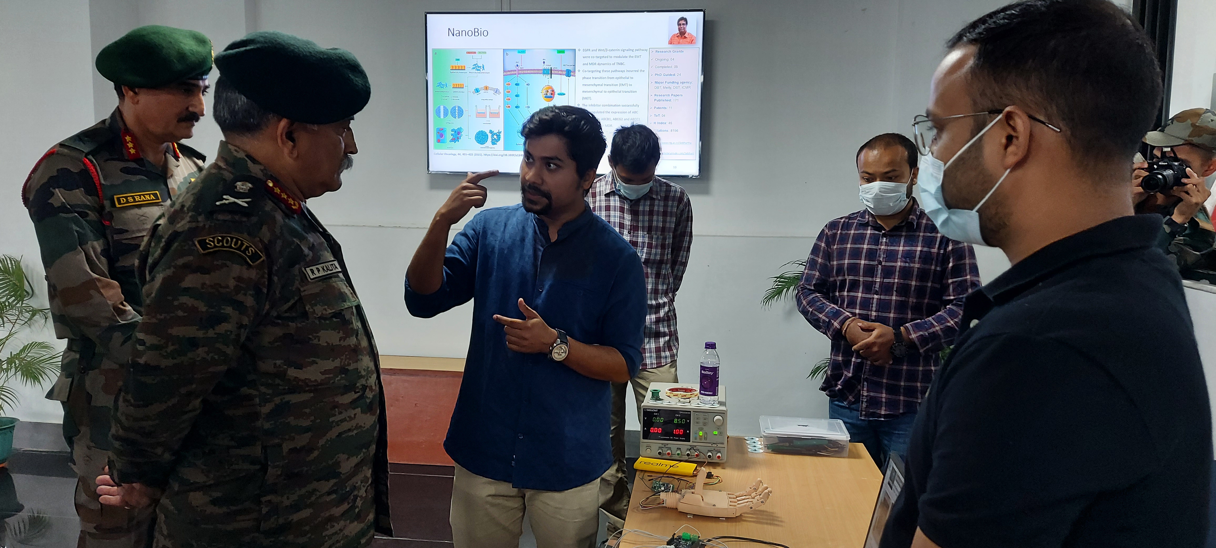 Symbica demonstrating the bionic hand prototype to Indian Army officers